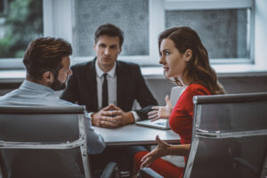 Establishing communication. Three colleagues having a business meeting in the office