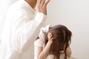 A violent man who has a domestic violence against a woman