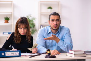 Young couple divorcing in alimony concept